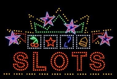 Slot game interface showing reel spin and win animations